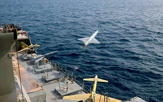 In this photo released by the Iranian Army on Aug. 25, 2022, a drone is launched from a warship in a military drone drill in Iran. (Iranian Army via AP)