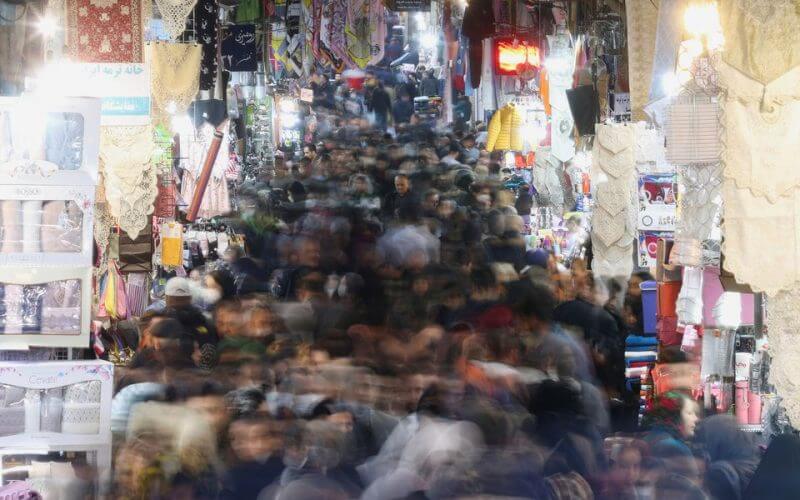 A long exposure image shows Iranians walking through Tehran Bazaar, in Tehran, Iran, February 1, 2023. Majid Asgaripour/WANA (West Asia News Agency) via REUTERS