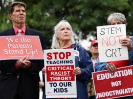 Protesters outside the Loudoun County School Board headquarters in Ashburn on June 22. (Evelyn Hockstein/Reuters)