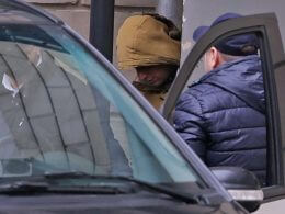 Evan Gershkovich leaves a court building in Moscow. news.sky.com