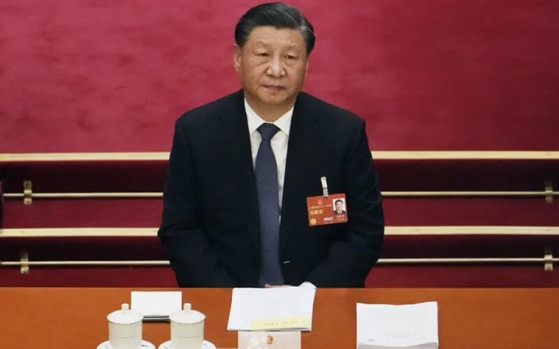 Chinese President Xi Jinping attends a session of China's National People's Congress (NPC) at the Great Hall of the People in Beijing, Tuesday, March 7, 2023. AP