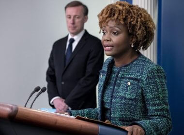 White House press secretary Karine Jean-Pierre, right, accompanied by White House national security adviser Jake Sullivan, left, speaks at a press briefing at the White House in Washington, Monday, April 24, 2023. (AP Photo/Andrew Harnik)