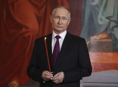 Russian President Vladimir Putin attends an Orthodox Easter service in the Christ the Savior Cathedral in Moscow, Russia, Saturday, April 15, 2023. (Sergei Karpukhin, Sputnik, Kremlin Pool Photo via AP)