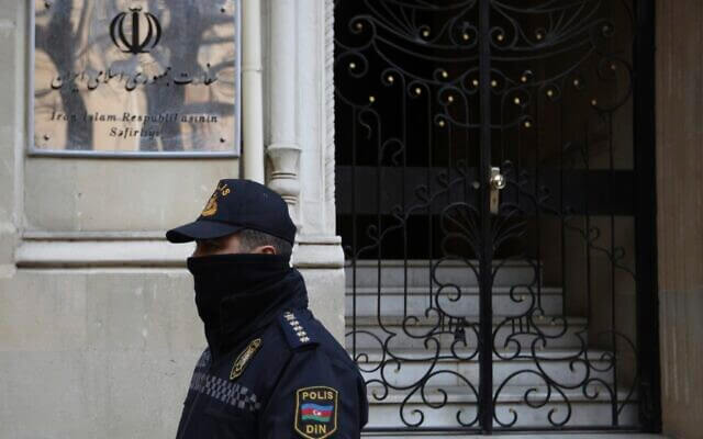 A police officer guards an area in front of the Iranian Embassy in Baku, Azerbaijan, Friday, Jan. 27, 2023. AP
