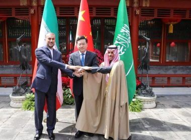 Iranian Foreign Minister Hossein Amir-Abdollahian and Saudi Arabia's Foreign Minister Prince Faisal bin Farhan Al Saud and Chinese Foreign Minister Qin Gang shake hands during a meeting in Beijing, China, April 6, 2023. Iran's Foreign Ministry/WANA (West Asia News Agency)/Handout via REUTERS