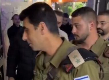 IDF officers seen at an iftar event hosted by prominent Palestinian businessmen near the West Bank city of Hebron on April 1, 2023 (Social media)