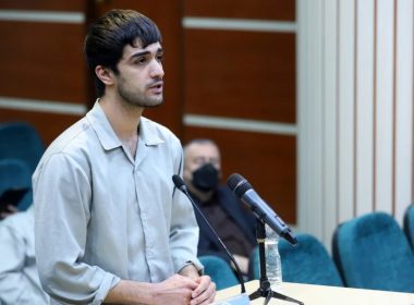 In this photo released by Mizan News Agency, Mohammad Mehdi Karami, a protester convicted and executed, speaks during his trial at the Revolutionary Court, in the city of Karaj, Iran, on Nov. 30, 2022. Iran said it executed Karami on Jan. 7, 2023. AP