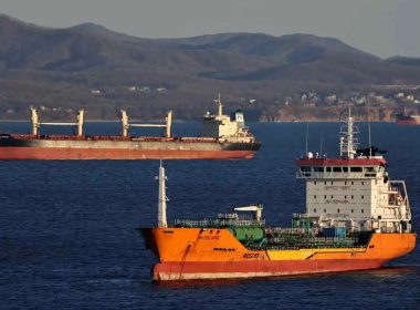 An oil tanker and bulk carrier are seen near the Russian port of Nakhodka in December. Reuters