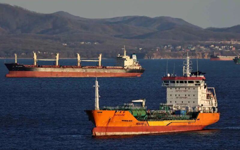An oil tanker and bulk carrier are seen near the Russian port of Nakhodka in December. Reuters