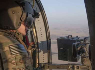 A UH-60 Blackhawk crew chief flies over the Syrian countryside, August 17, 2019. (U.S. Army photo by Spc. Alec Dionne)