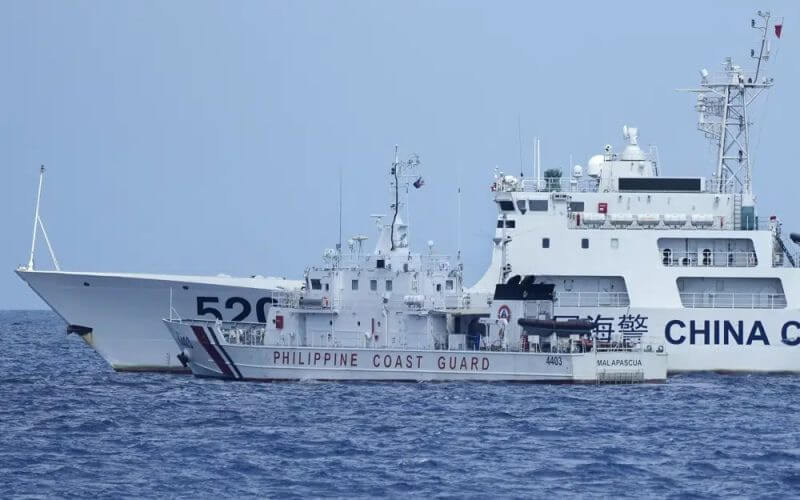 A Chinese Coast Guard ship with bow number 5201 blocks Philippine Coast Guard ship BRP Malapascua as it maneuvers to enter the mouth of the Second Thomas Shoal locally known as Ayungin Shoal at the South China Sea on Sunday, April 23, 2023. AP