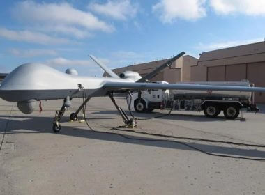 A Predator drone owned by the U.S. Customs and Border Protection sits on the tarmac awaiting takeoff from the agency's Grand Forks Air Force Base operations in North Dakota. Dave Kolpack | AP file photo