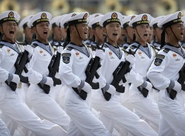 Soldiers from China's People's Liberation Army (PLA) Navy march in formation during a parade to commemorate the 70th anniversary of the founding of Communist China in Beijing, Oct. 1, 2019. (AP Photo/Mark Schiefelbein, File)