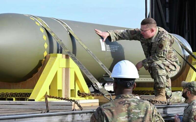 In this photo released by the U.S. Air Force on May 2, 2023, airmen look at a GBU-57, or the Massive Ordnance Penetrator bomb, at Whiteman Air Base in Missouri. (U.S. Air Force via AP)