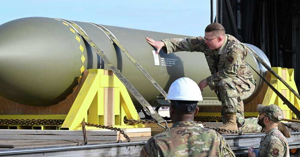 In this photo released by the U.S. Air Force on May 2, 2023, airmen look at a GBU-57, or the Massive Ordnance Penetrator bomb, at Whiteman Air Base in Missouri. (U.S. Air Force via AP)