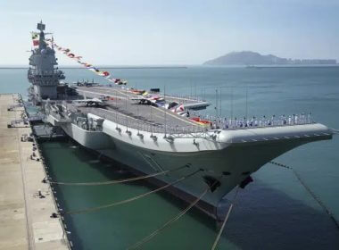 In this Dec. 17, 2019, file photo provided by Xinhua News Agency, the Shandong aircraft carrier is docked at a naval port in Sanya in southern China's Hainan Province. (Li Gang/Xinhua via AP, File)