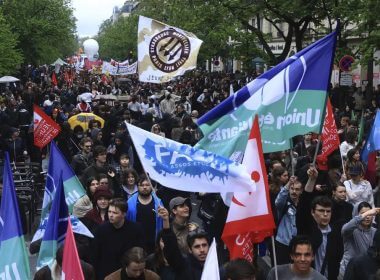 Protesters march during a demonstration, Monday, May 1, 2023 in Paris. AP