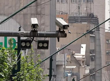 CCTV cameras are shown overlooking a street in Tehran, Iran, on April 10, 2023. Police in Iran say they plan to use "smart" technology in public places to identify and then penalize women who violate the country's strict Islamic dress code. Atta Kenare / AFP via Getty Images