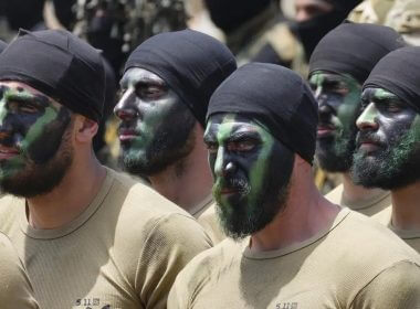 Fighters from the Lebanese militant group Hezbollah carry out a training exercise in Aaramta village in the Jezzine District, southern Lebanon, Sunday, May 21, 2023. (AP Photo/Hassan Ammar)