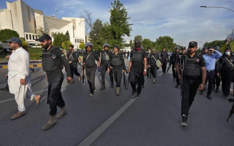 Police commandos patrol outside the Supreme Court, where Pakistan's former Prime Minister Imran Khan is appeared, in Islamabad, Pakistan, Thursday, May 11, 2023. (AP Photo/Anjum Naveed)