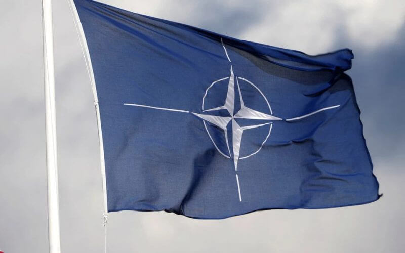 A NATO flag flutters at the Tapa military base, Estonia April 30, 2023. REUTERS