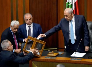 Lebanese Parliament Speaker Nabih Berri, right, casts his vote as parliament gathers to elect a president at the parliament building in downtown Beirut, Lebanon, Wednesday, June 14, 2023. (AP Photo/Hassan Ammar)