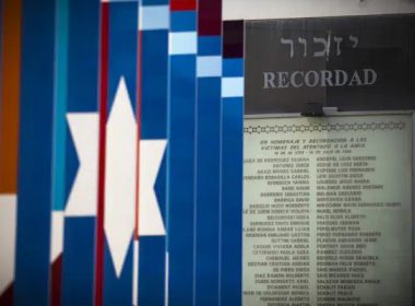 A plaque with the word in Spanish "Remember" and the names of the victims of the 1994 terrorist attack on the the Jewish community center AMIA is placed inside the AMIA compound in Buenos Aires, Argentina, Feb. 8, 2013. (AP Photo/Victor R. Caivano, File)