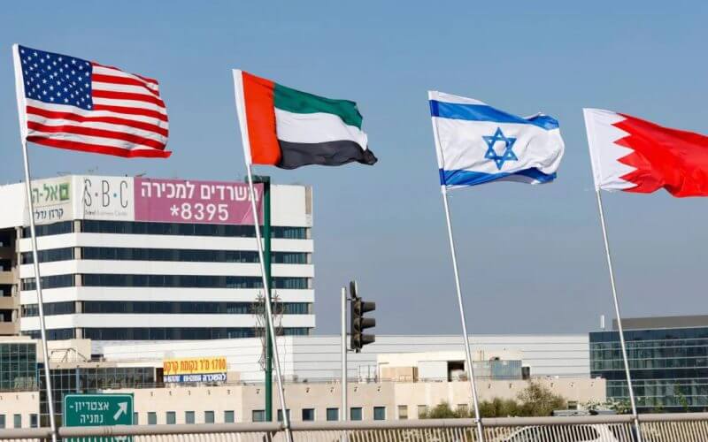 The flags of the United States, the United Arab Emirates, Israel, and Bahrain are flown along a road in Netanya, Israel, on Sept. 13, 2020, marking the signing on Sept. 15 of the Abraham Accords Peace Agreement. (Jack Guez/AFP via Getty Images)