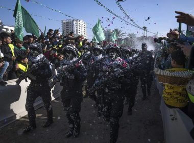 Members of the Izz ad-Din al Qassam Brigades, the armed wing of the Palestinian group Hamas, parade on Hamas' 35th anniversary in Gaza City, Wednesday, Dec. 14, 2022. (AP Photo/Fatima Shbair)