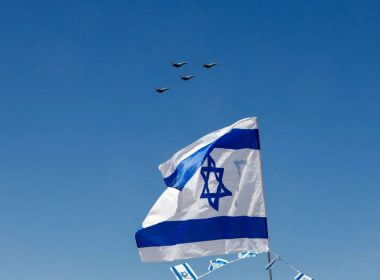 A flypast is seen over an Israeli flag as part of an aerial show organised for Israel's 75th Independence Day celebrations, in Tel Aviv, Israel April 26, 2023. REUTERS