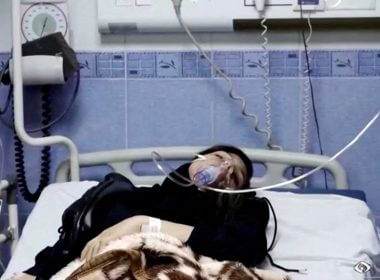 A young woman lies in hospital after reports of poisoning at an unspecified location in Iran in this still image from video from March 2, 2023. WANA/Reuters TV via REUTERS