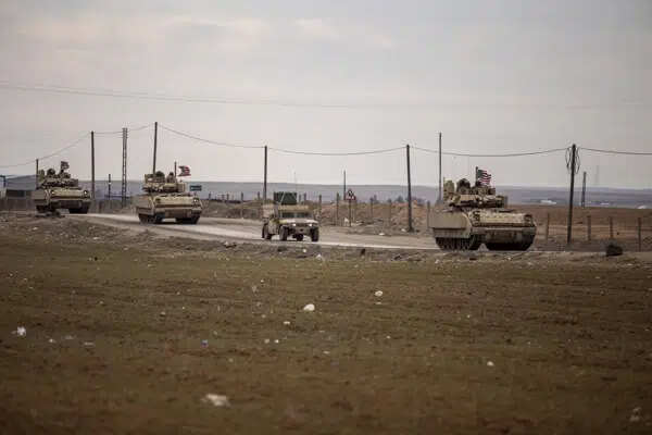 American military convoy patrol in Hassakeh, Syria, on Feb. 8, 2022. (AP Photo/Baderkhan Ahmad, File)
