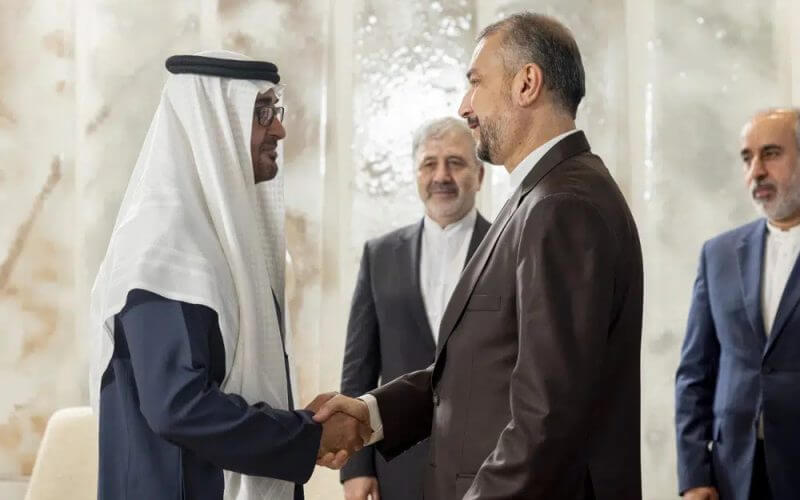 In this photo released by UAE Presidential Court, UAE President Sheikh Mohamed bin Zayed Al Nahyan, greets Hossein Amir Abdollahian, Iran's Minister of Foreign Affairs at Shati Palace in Abu Dhabi, United Arab Emirates, Thursday, June 22, 2023. (Ryan Carter/UAE Presidential Court via AP)