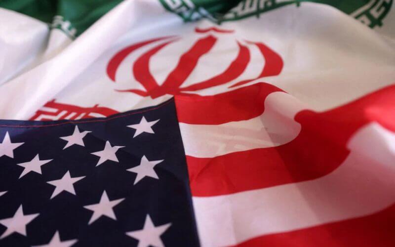 USA and Iranian flags are seen in this illustration taken, September 8, 2022. REUTERS/Dado Ruvic/Illustration