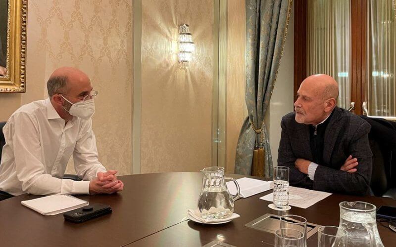 U.S. Special Envoy for Iran Robert Malley (L) and Barry Rosen sit at a table during an interview with Reuters in Vienna, Austria, January 23, 2022. REUTERS