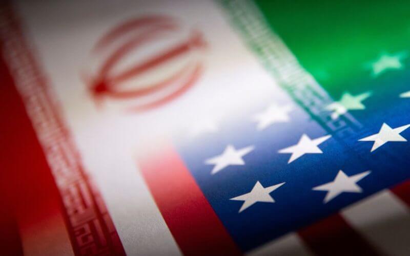 Iran's and U.S.' flags are seen printed on paper in this illustration taken January 27, 2022. REUTERS