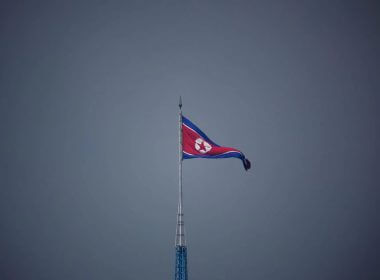 A North Korean flag flutters at the propaganda village of Gijungdong in North Korea, in this picture taken near the truce village of Panmunjom inside the demilitarized zone (DMZ) separating the two Koreas, South Korea, July 19, 2022. REUTERS