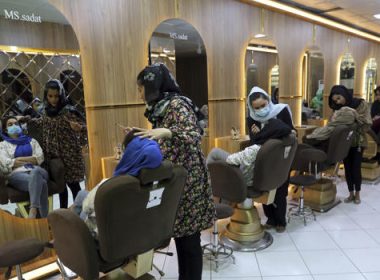 Beauticians put makeup on customers at Ms. Sadat's Beauty Salon in Kabul, Afghanistan, Sunday, April 25, 2021. (AP Photo/Rahmat Gul, File)