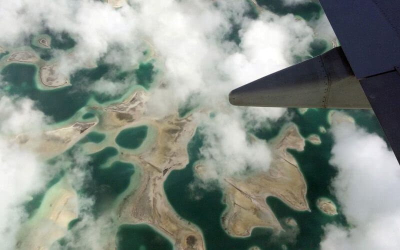 Lagoons can be seen from a plane as it flies above Kiritimati Island, part of the Pacific Island nation of Kiribati, April 5, 2016./File Photo