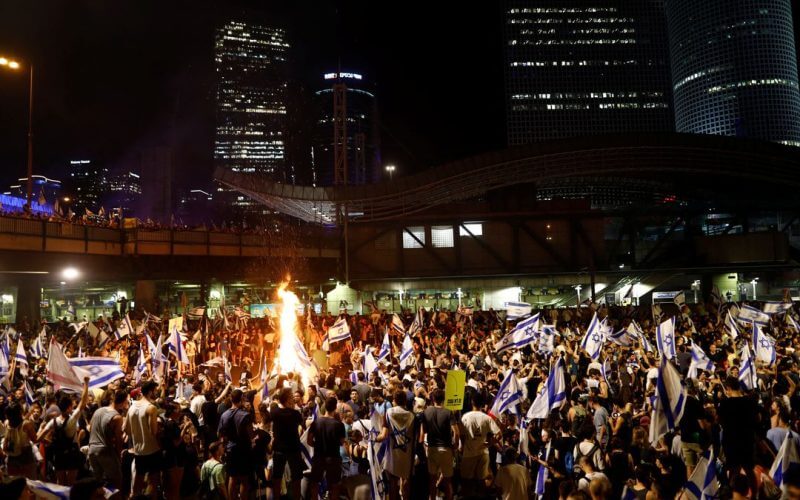 Protesters block Ayalon Highway during a demonstration following a parliament vote on a contested bill that limits Supreme Court powers to void some government decisions, in Tel Aviv, Israel July 24, 2023. REUTERS