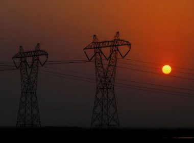 Power poles and power lines are pictured in Basra, Iraq August 20, 2021. REUTERS