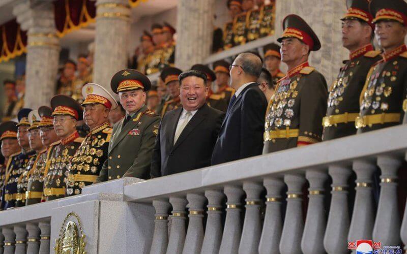 North Korean leader Kim Jong Un (C) has reaffirmed his country’s close military ties with China in a high-level meeting held Friday, one day after hosting a major military parade to celebrate the 70th anniversary of the end of the Korean War (pictured). Photo by the Korean Central News Agency