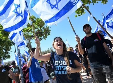 Israeli protesters hold Israeli flags and chant for democracy at a demonstration against Prime Minister Benjamin Netanyahu's judicial overhaul, outside the Supreme Court in Jerusalem, on Tuesday. Photo by Debbie Hill/UPI