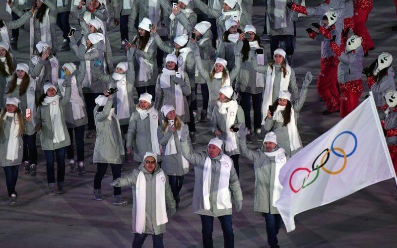 Russia and Belarus won't be invited to the 2024 Olympics in Paris, the International Olympic Committee said Thursday. Since 2017, Russian athletes (such as those pictured at the opening ceremony of the 2018 Winter Olympics in Daegwalnyeong, South Korea), have been barred from displaying national symbols in response to Russia's state-backed doping program. File Photo by Richard Ellis/UPI