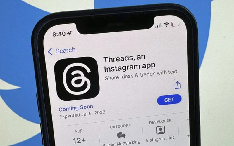 The announcement of the social media app 'Threads' is displayed in Apple's US App Store seen on the screen of a smartphone in Berlin, Germany, Tuesday, July 4, 2023. (Christoph Dernbach/dpa via AP)