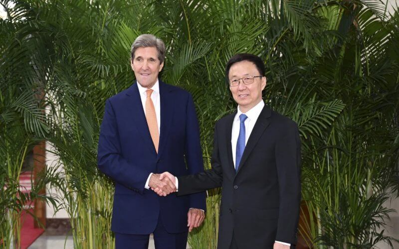 In this photo released by Xinhua News Agency, U.S. Special Presidential Envoy for Climate John Kerry, left, shakes hands with Chinese Vice President Han Zheng during a meeting in Beijing, Wednesday, July 19, 2023. China is willing to work with Washington on reducing global warming as long as its political demands are met, Han told Kerry on Wednesday. (Zhang Ling/Xinhua via AP)