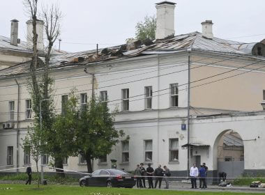 Investigators examine an area next to a damaged building after a reported drone attack in Moscow, Russia, Monday, July 24, 2023. (AP Photo)