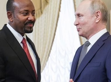 Russian President Vladimir Putin, right, and Ethiopian Prime Minister Abiy Ahmed shake hands during their meeting on the eve of the Russia Africa Summit in St. Petersburg, Russia, Wednesday, July 26, 2023. (TASS News Agency Host Pool Photo via AP, File)