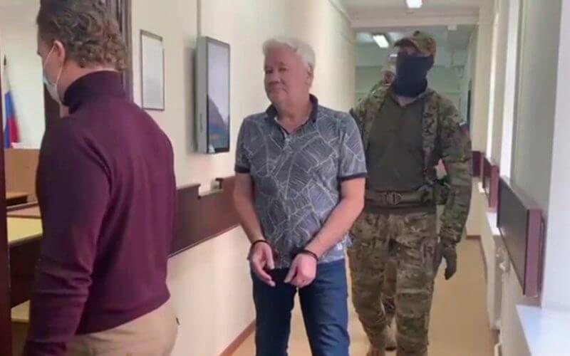 In this handout photo taken from video released by Lefortovo District Court, Robert Shonov walks to the court room in Moscow, Russia, May 18, 2023. AP