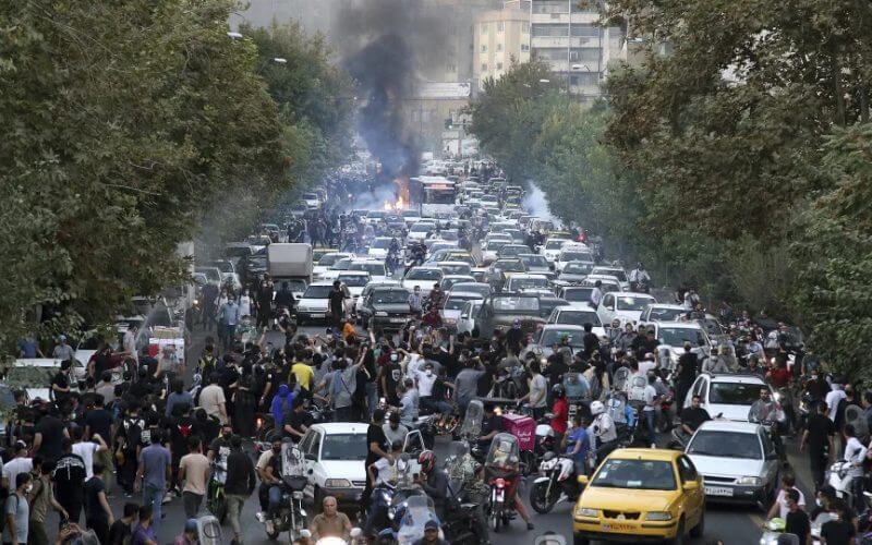 Iranians protest after the death of 22-year-old Mahsa Amini, in downtown Tehran, Iran, in September 2022. AP